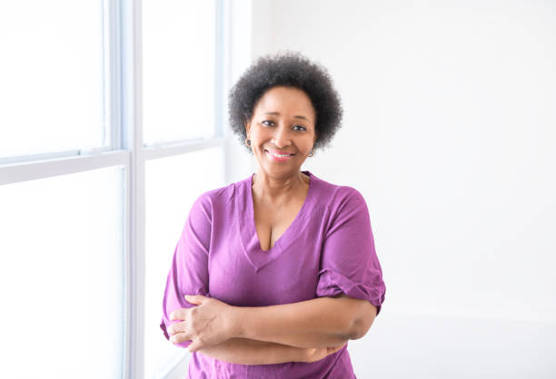 istock senior black American woman on white background studio 2063709714
