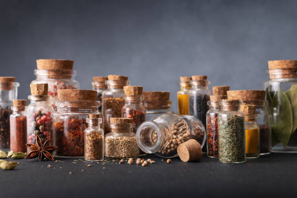 istock Seasoning (herbs and spices) in small bottles with cork 2063733807