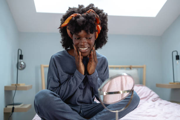 istock Young woman having a face care routine in the morning 2063758145