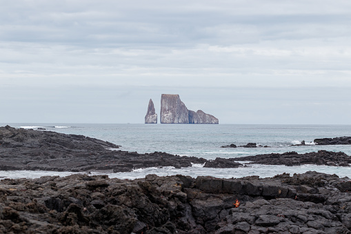 Kicker Rock or roca leon dormido sticking out of the ocean, San Cristobal, Galapagos.