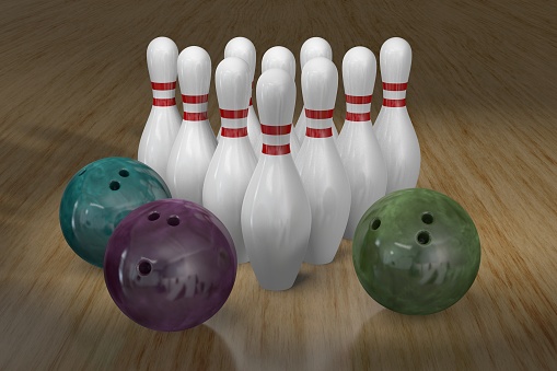 motion blur of bowling ball skittles on the playing field