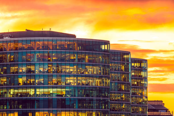 istock Illuminated office buildings in London at Night 2063996702