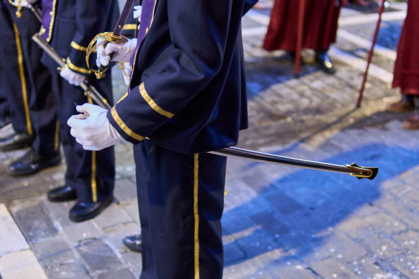 istock Formal Ceremony with Uniformed Individuals Holding a Sword 2064082017