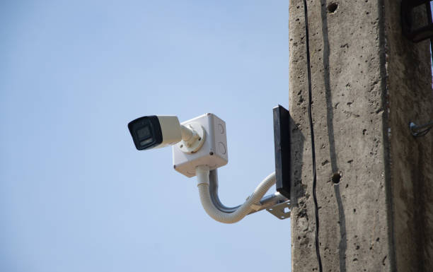 istock CCTV surveillance security camera video equipment on pole outdoor building safety system area control and copy space 2064084820
