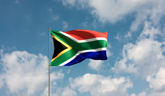 Flag South Africa against cloudy sky. Country, nation, union, banner, government, South African culture, politics. 3D illustration