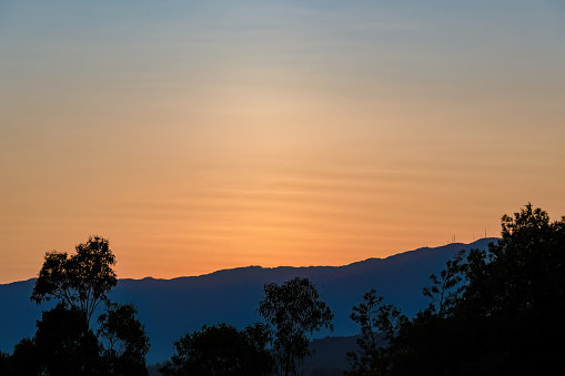 Some singular waved clouds in a sunset, over the eastern Andean mountains of central Colombia.