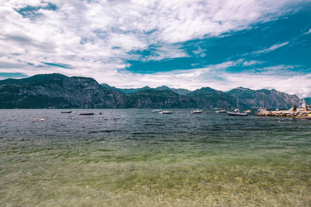 Italian Lake Garda paradise panorama sunset: Alpine relax landscape, Malcesine