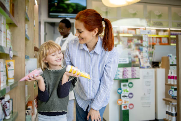 istock Mother and daughter at the pharmacy 2064277719