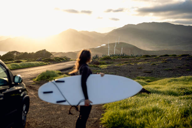istock Surfing and eco mind. Green energy is the choice. 2064280425