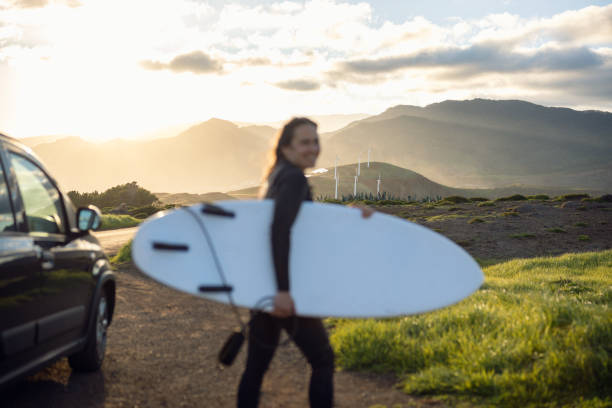 istock Surfing and eco mind. Wind power is the star. 2064280440