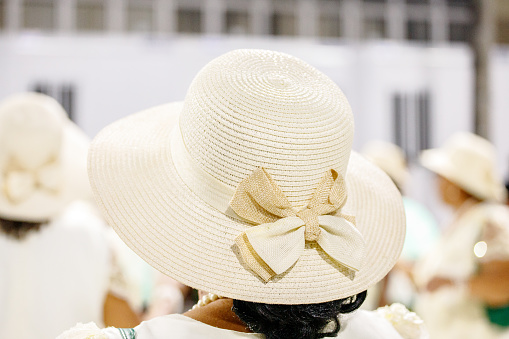 Cream-colored women's hat in Rio de Janeiro, Brazil.