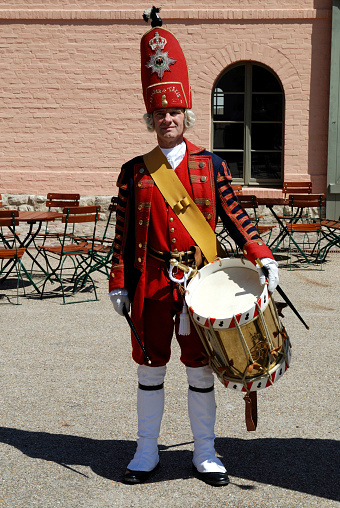0Drummers of the Giant Guard in historical Prussian uniform drilling at the Bornstedt Crown Estate in Potsdam - Germany.
