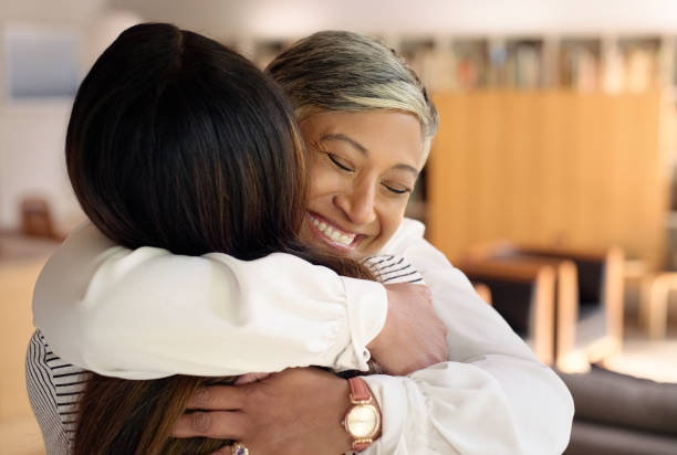 istock Mother, daughter and hug with care for gratitude and love, happy and bonding with affection for support. Family, embrace and together for happiness at home with close comfort, security and safety 2064458355