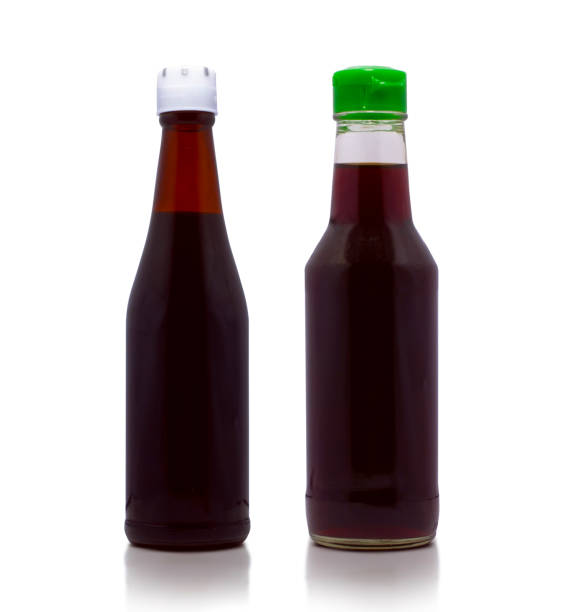istock Bottles with tasty sauces isolated on white background 2064508466