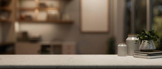 istock A tabletop features books and decor with a blurred background of a modern home office. 2064547301