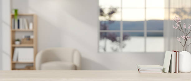 istock A minimalist wood table featuring a presentation space in a minimalist white living room. 2064557671