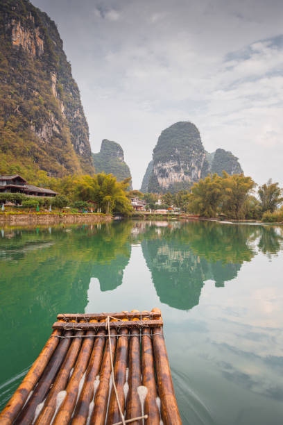 istock Beautiful Li river bamboo side Karst mountain landscape in Yangshuo, China 2064578326