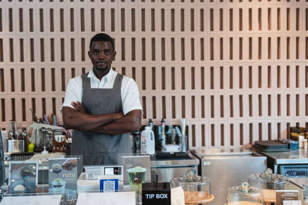 istock Confident business man working in a cafe business 2064605715