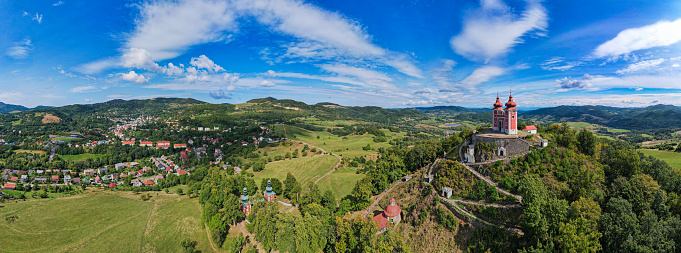 Aerial view above the beautiful Slovakian village Banská Štiavnica in Slovakia during summer