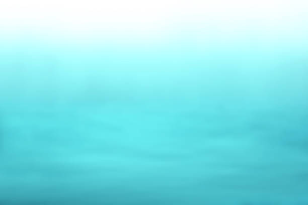 istock Pale waves gradating from bright turquoise blue to white, image texture 2064661559