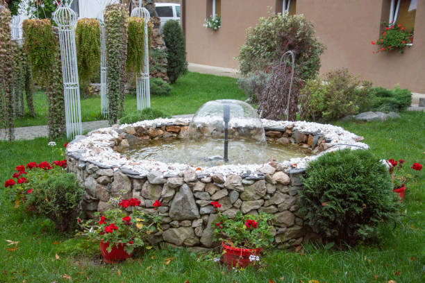 The nuns' cells and Artesian fountain  at Dumbrava Monastery, Alba, ROMANIA, 2021