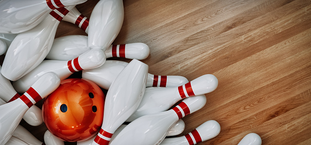 Bowling balls and bowling pins placed on a wooden background. 3d, rendering, illustration,
