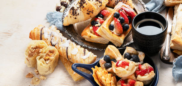 istock Freshly baked pastry. Delicious dessert table. 2064887906