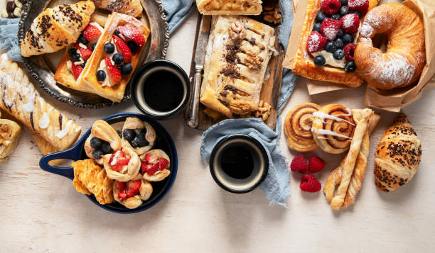 istock Freshly baked pastry. Delicious dessert table. 2064890575