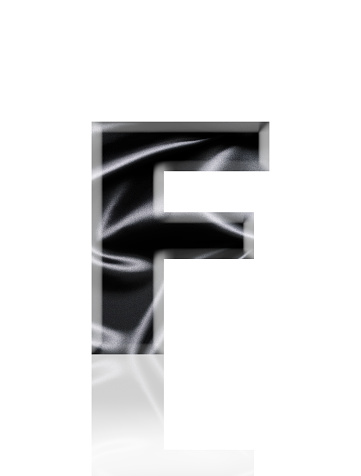 Close-up of three-dimensional crumpled black satin alphabet letter F on white background.