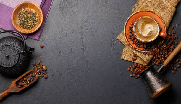 istock A tantalizing display of roasted coffee beans and dry tea leaves, accompanied by an espresso coffee cup and a teapot 2064915519
