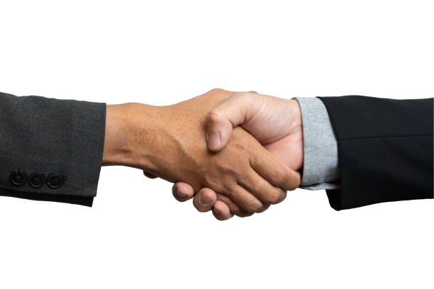 istock Close up two man shaking hand on white background. Successful businessmen shake hands and close the deal. 2064927480