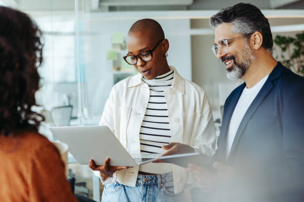 istock Business people working together in a cooperative and communication-focused teamwork environment 2064933229