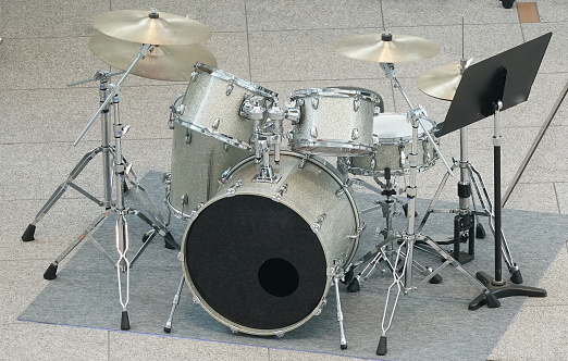 Standard drum kit with base,, snare,, 3 toms,, hi-hat and 2 crash cymbals