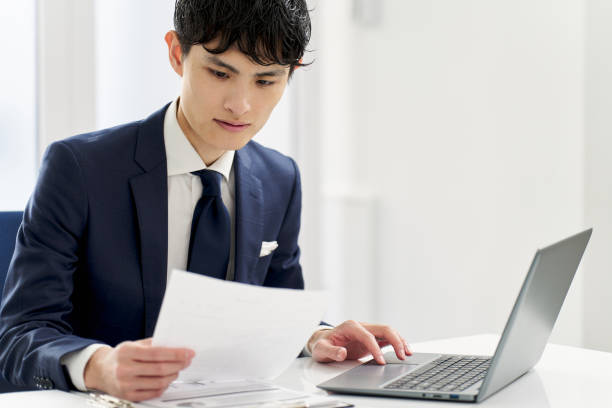 istock Businessman checking the contents of documents 2065003635
