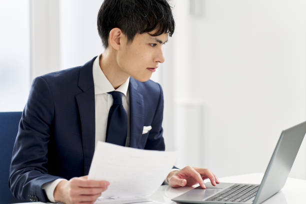 istock Businessman checking the contents of documents 2065003636