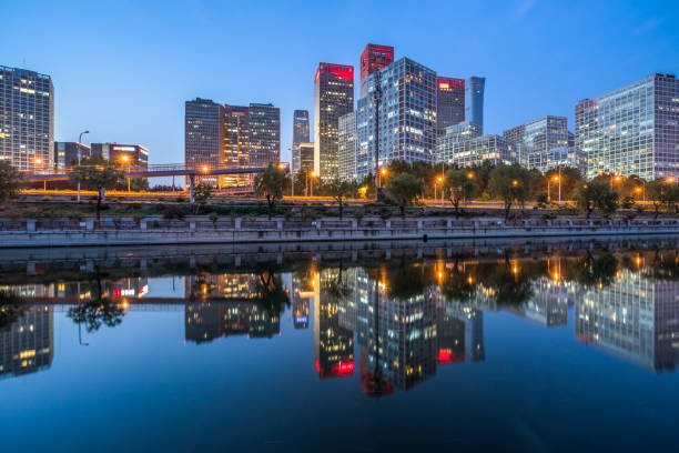 istock Business district office buildings and water reflection in Beijing at night 2065040520
