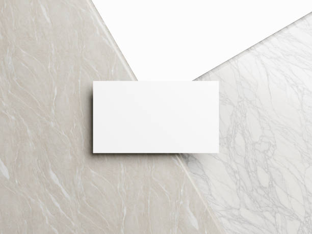 istock Business card on white marble background 2065058567