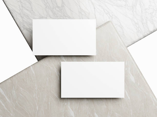 istock Business card on white marble background 2065060711