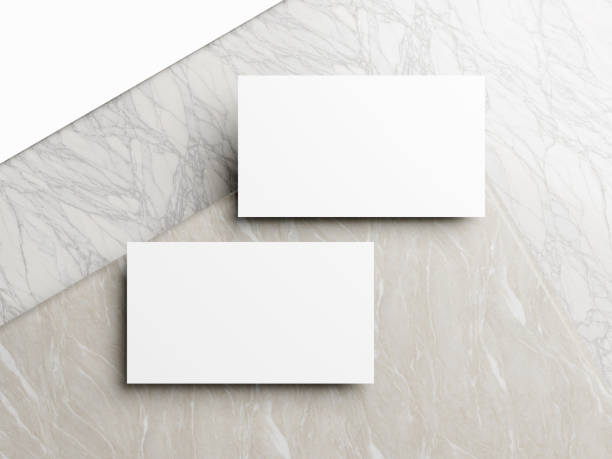 istock Business card on white marble background 2065060712