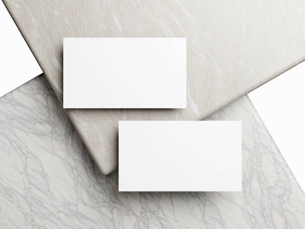 istock Business card on white marble background 2065060716