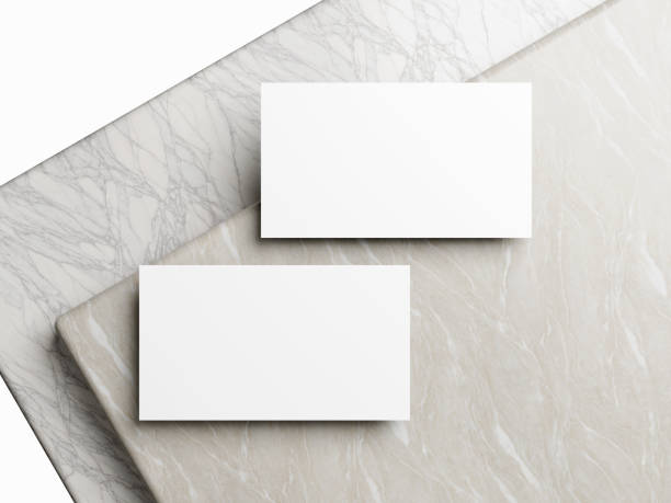 istock Business card on white marble background 2065060729