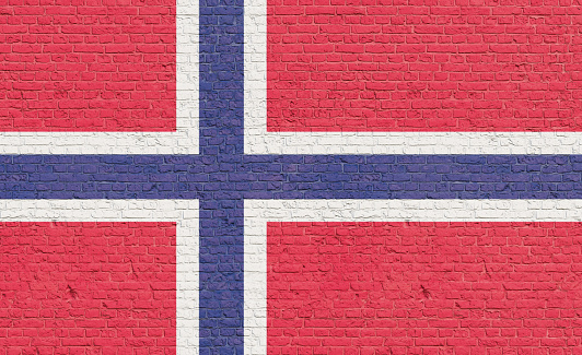 Norway flag colors painted on a brick wall. National colors, country, banner, government, Norwegian culture, politics.