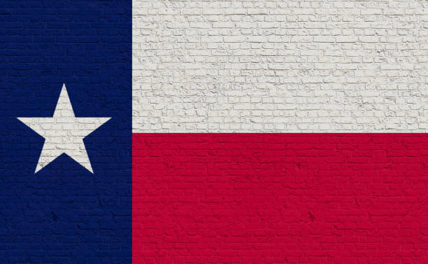istock Texas flag colors painted on a brick wall. 2065078360