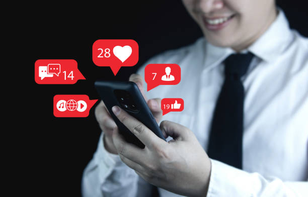 istock Men use smartphones to interact with social media. 2065093424