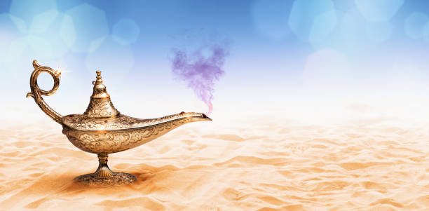 istock Genie's lamp on the sand 2065095604