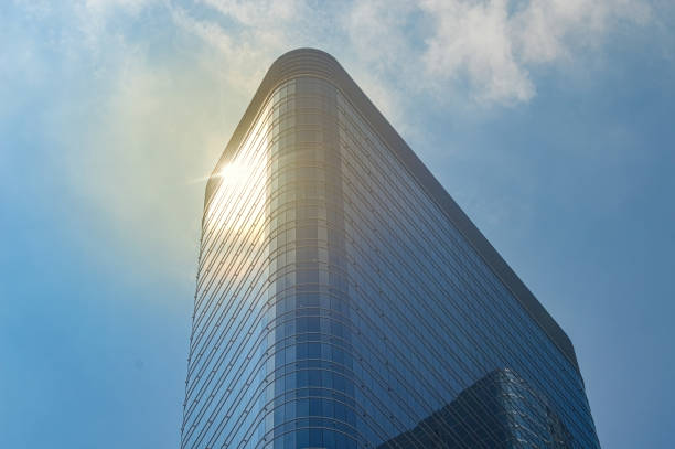 a modern office tower building or apartment with copy space during the day