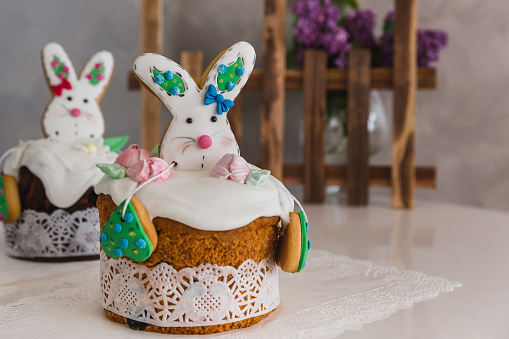 Easter Cakes decorated with bunny gingerbread - Traditional Kulich, Paska Easter Bread. Traditional Easter spring