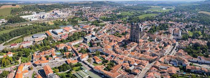 Aerial view around the old town of the city Saint-Nicolas-de-Port on a sunny day in early spring.