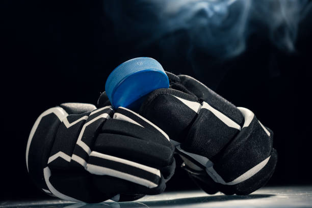 Hockey gear on the ice rink.