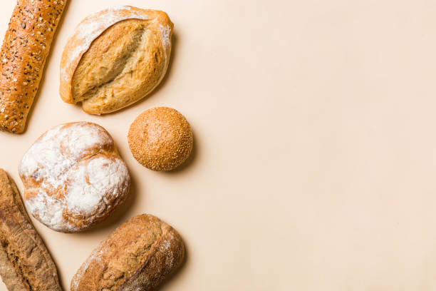 istock Homemade natural breads. Different kinds of fresh bread as background, top view with copy space 2065177277